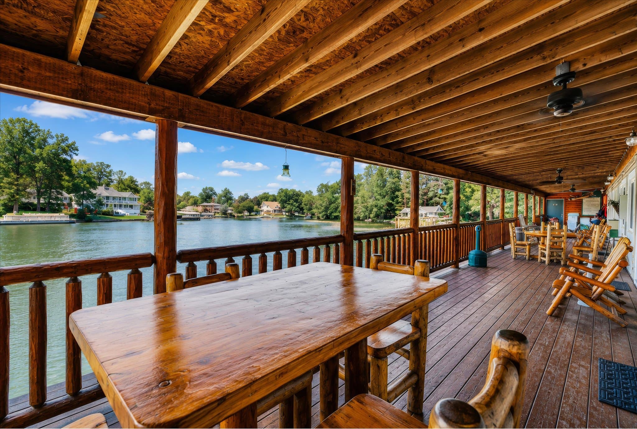 Lakefront setting and covered deck at Olde Mill Inn of Clarkston