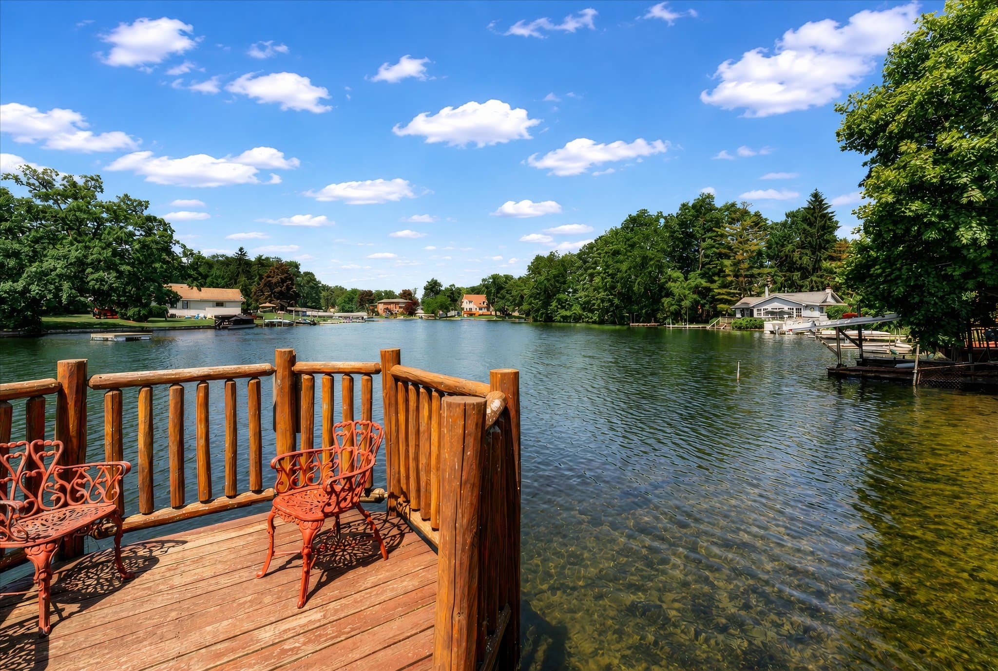 Lakefront setting and covered deck at Olde Mill Inn of Clarkston